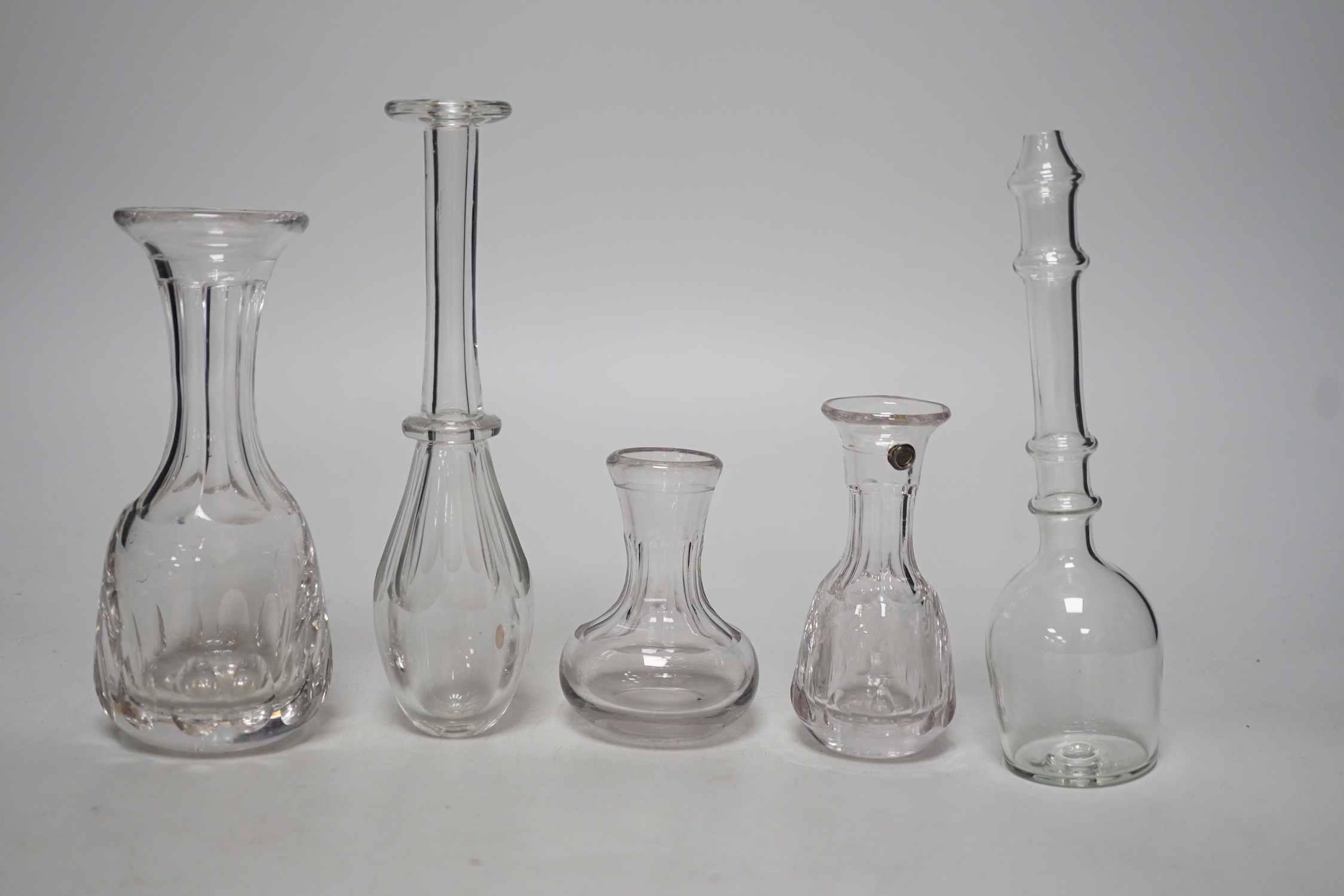 Three 19th century glass measures and two toddy lifts (5), tallest 19cms high